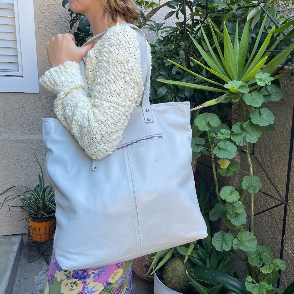 Light blue pebbled leather large tote with wristlet